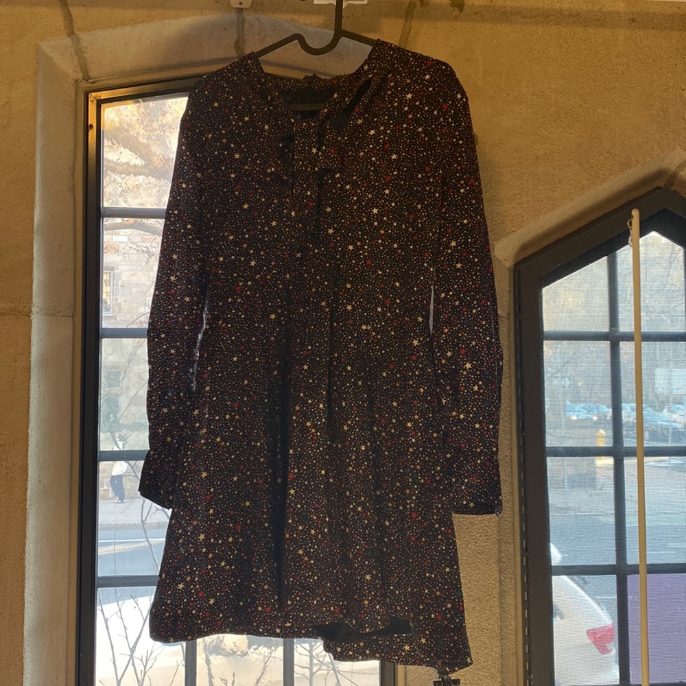 Almost never worn star patterned made well pleated dress